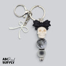 3-D Cream w/ Shimmer Skull Silicone Focal Bead 21x16x21mm (Package of 2)