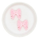 White Outlined Pink Bow Glitter Silicone Focal Bead 32mm (Package of 2)