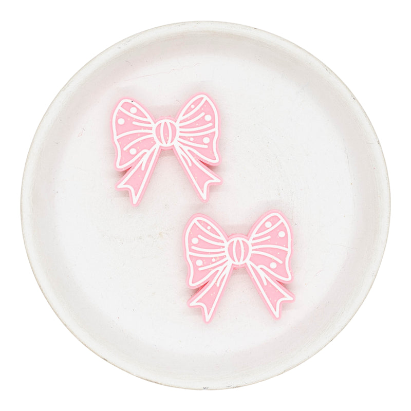 White Outlined Pink Bow Glitter Silicone Focal Bead 32mm (Package of 2)