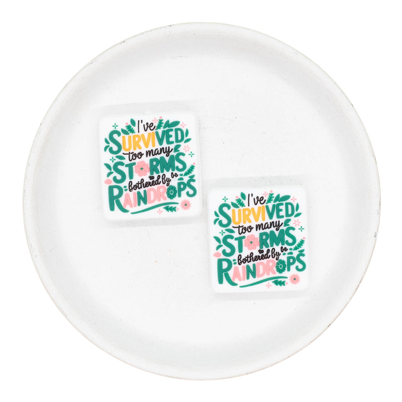 I Survived Too Many Storms to be Bothered by Raindrops Silicone Focal Bead 31x29mm (Package of 2)