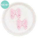 White Outlined Pink Bow Glitter Silicone Focal Bead 32mm (Package of 2)